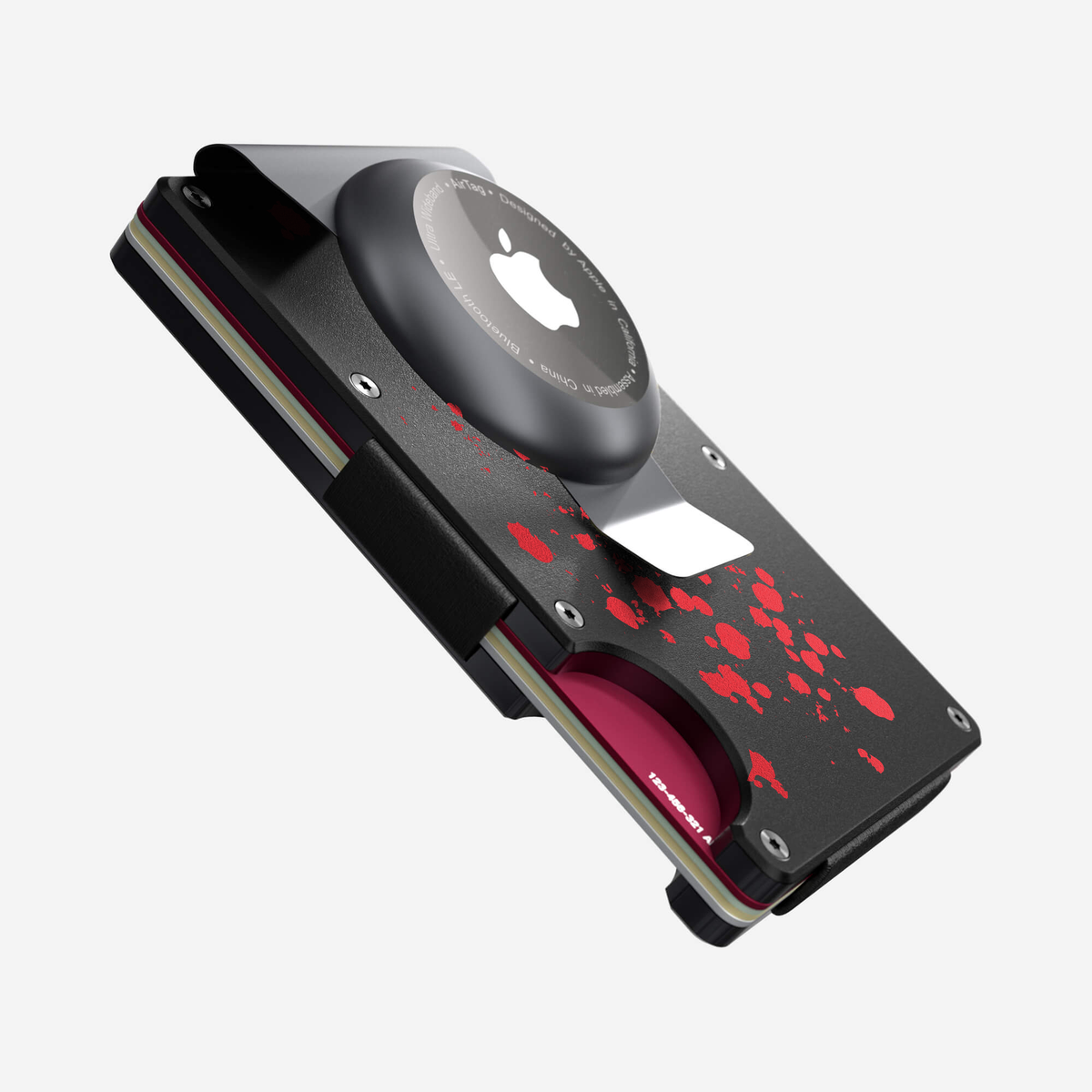 Angled side view of the NANO Aluminium AirTag Money Clip Wallet in Crimson Trace