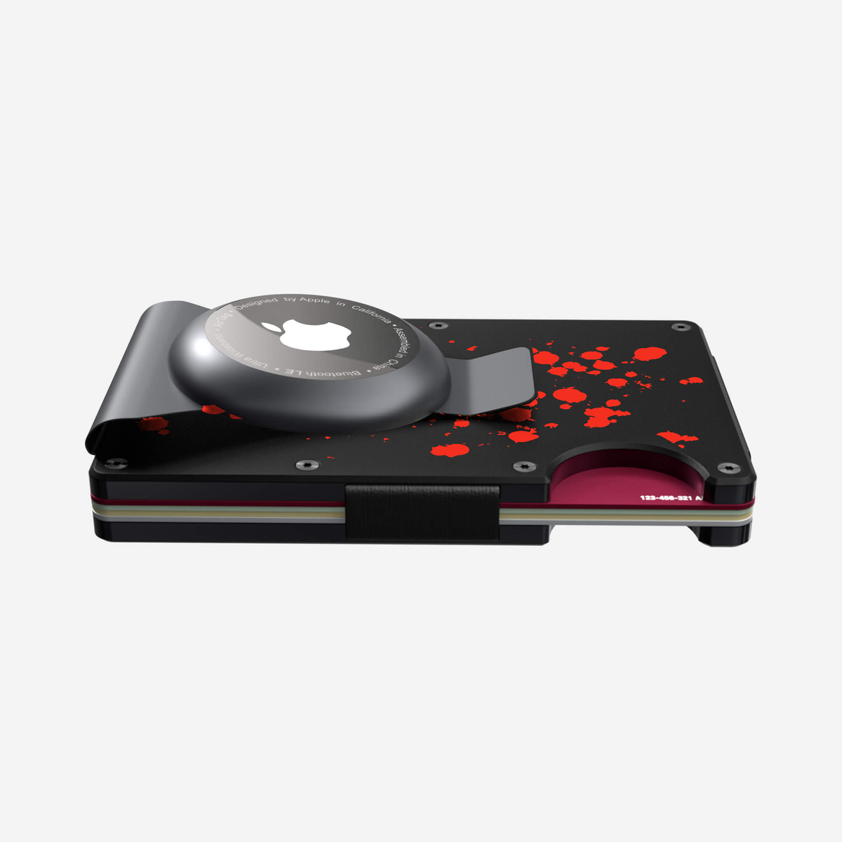 Slim profile view of the NANO Aluminium AirTag Money Clip Wallet in Crimson Trace