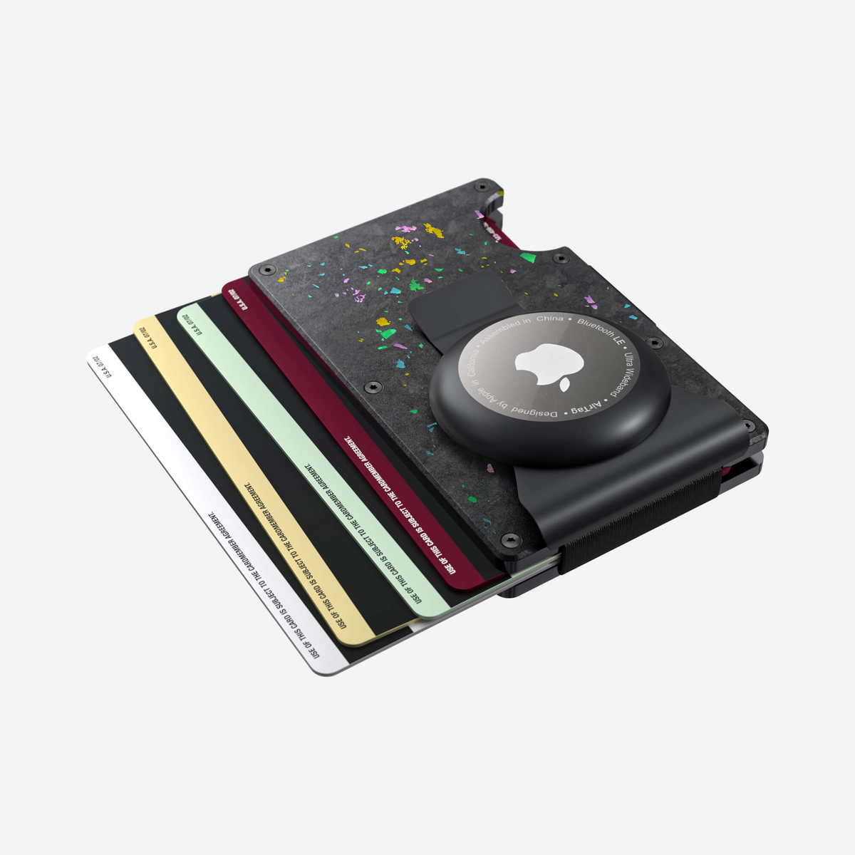 Angled aerial view showing cards fanned out of the NANO™ Forged Carbon AirTag Money Clip Wallet in Nero/Prisma