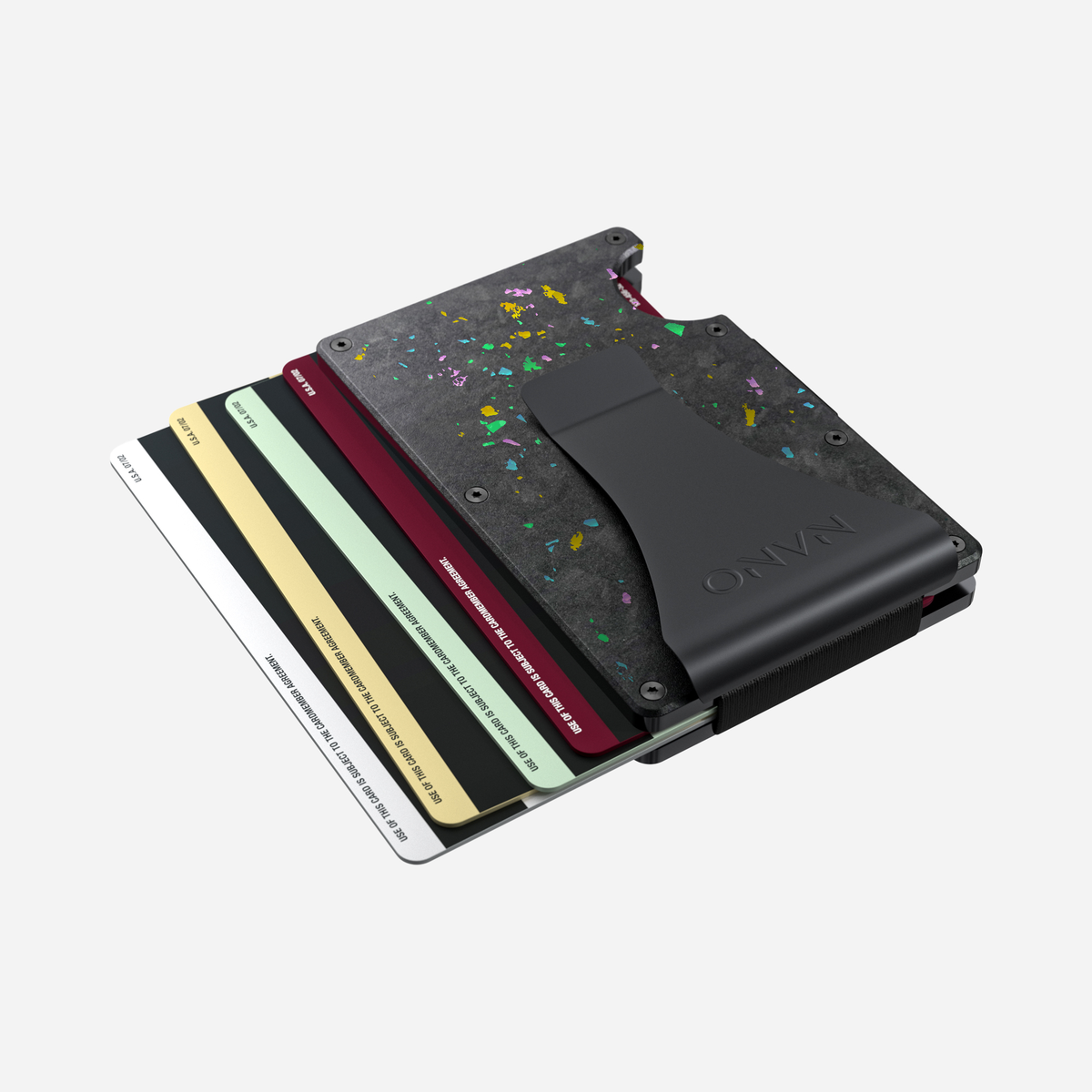 Angled aerial view showing cards fanned out of the NANO™ Forged Carbon Money Clip Wallet in Nero/Prisma