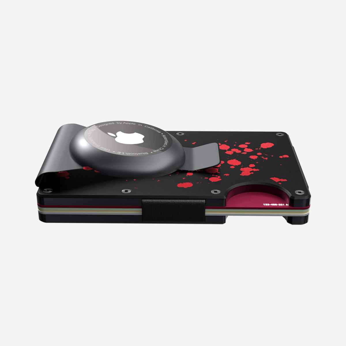 Slim profile view of the NANO Aluminium AirTag Money Clip Wallet in Crimson Trace