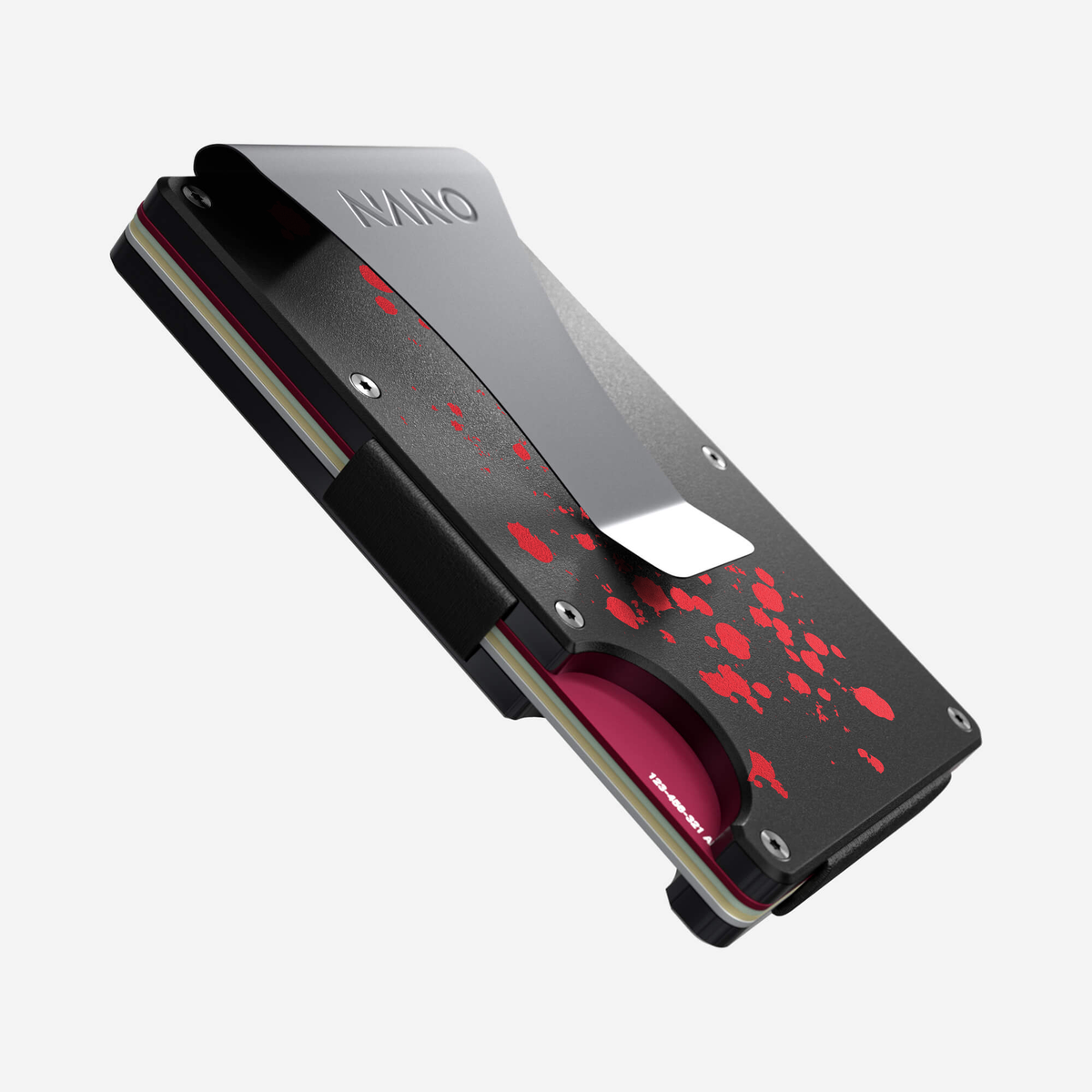 Angled side view of the NANO™ Aluminium Money Clip Wallet in Crimson Trace showing the thumb slot