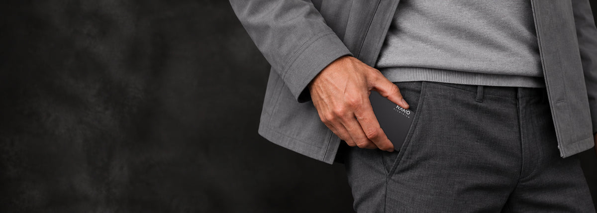 NANO Aerospace Aluminium wallet slipping naturally into a trouser pocket.