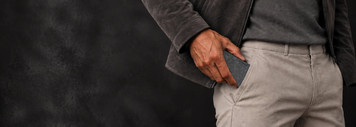 NANO Forged Carbon wallet slipping naturally into a trouser pocket.